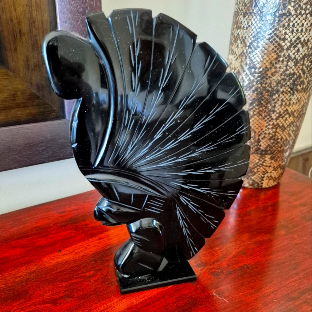 Hand Carved Artisinal Obsidean stone decoration.